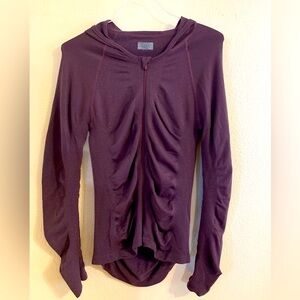 Athleta twinkly purple hoodie w ruching around zipper. Size M.